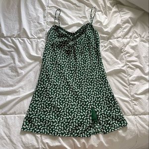 PRINCESS POLLY- Green mini dress with small slit at bottom.